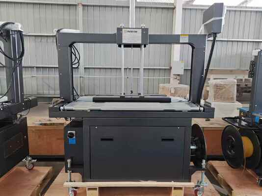 Kwaliteit  Semi-Automatic 1200mm Carton Box Strapping Machine with One Year Warranty for Efficient Packing Fabriek